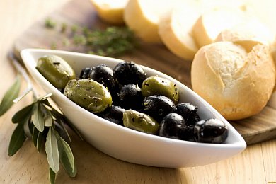 Оливки Каламата со специями Ophellia 250г, вакуумный пакет